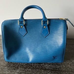 Gently used Louis Vuitton handbag with authenticity card